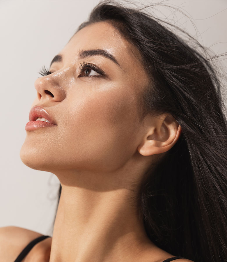 woman looking up | Arslanian Plastic Surgery Atlanta