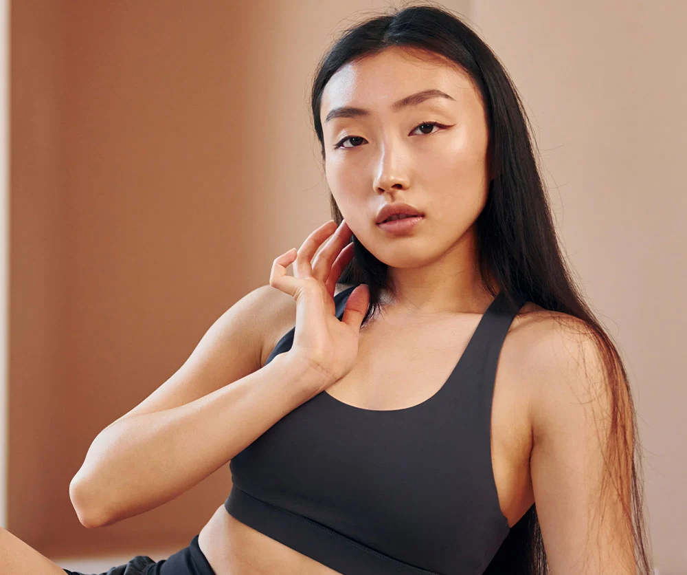 asain girl wearing work out gear | Arslanian Plastic Surgery Atlanta