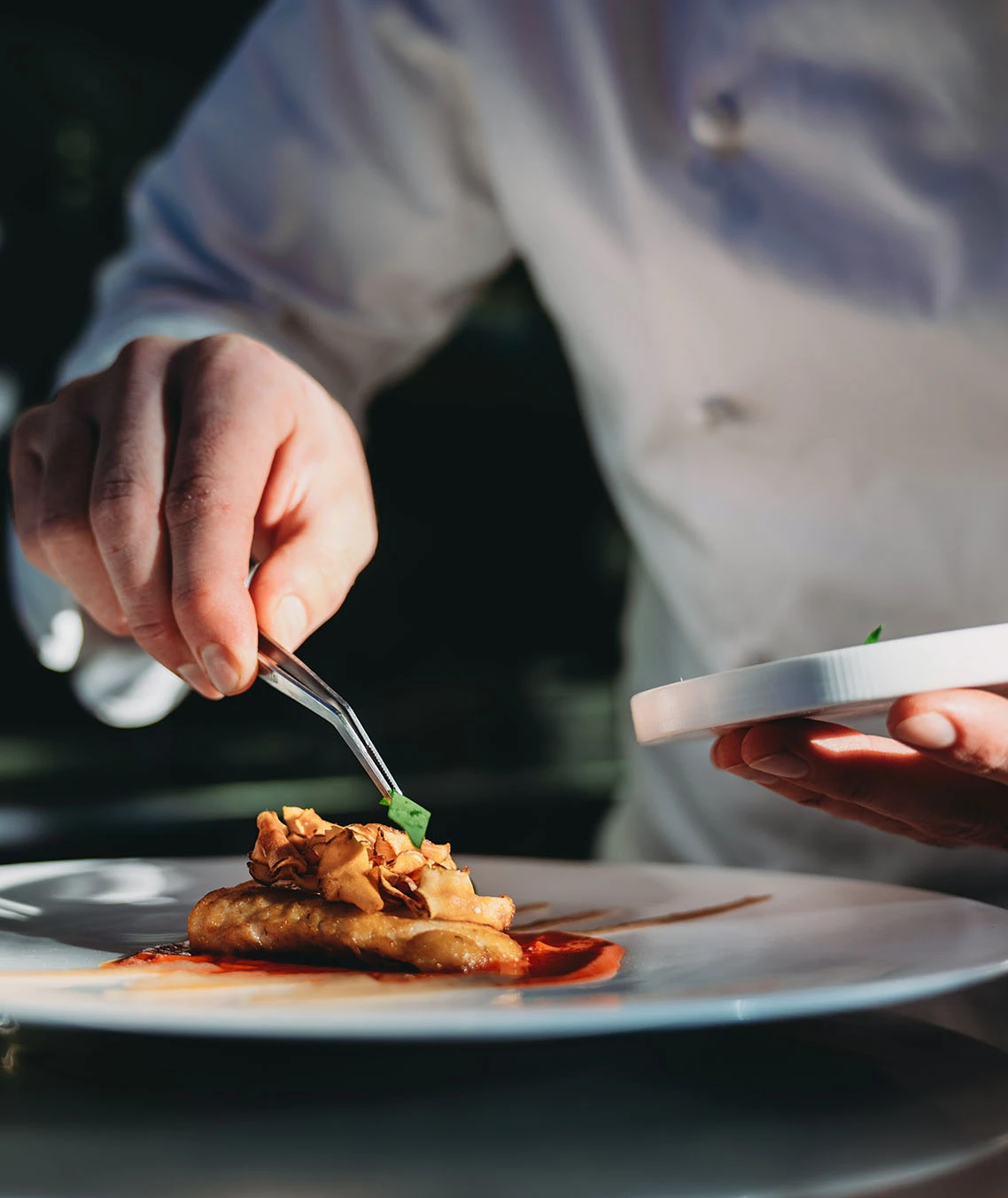 man preparing a plate